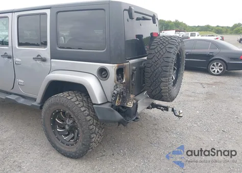 2015 Jeep Wrangler Unlimited Sahara from USA, damaged, VIN 1C4BJWEG7FL604294